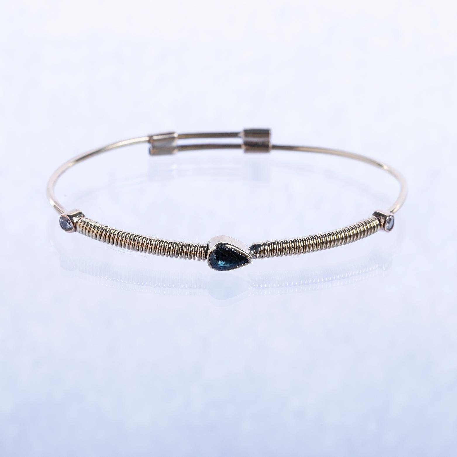 Pulsera en oro amarillo, zafiro y zirconias