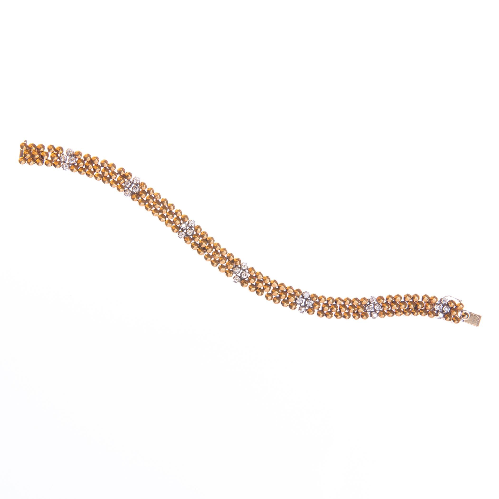 Pulsera oro 18 K amarillo y blanco y brillantes