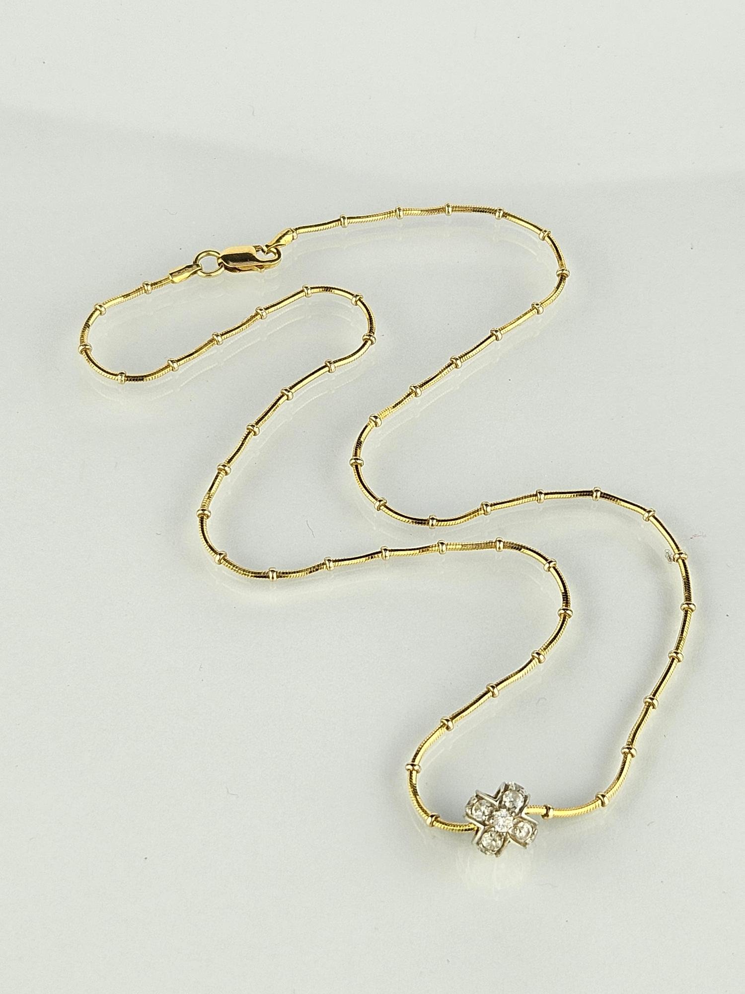 Gargantilla oro 18 K amarillo y zirconias