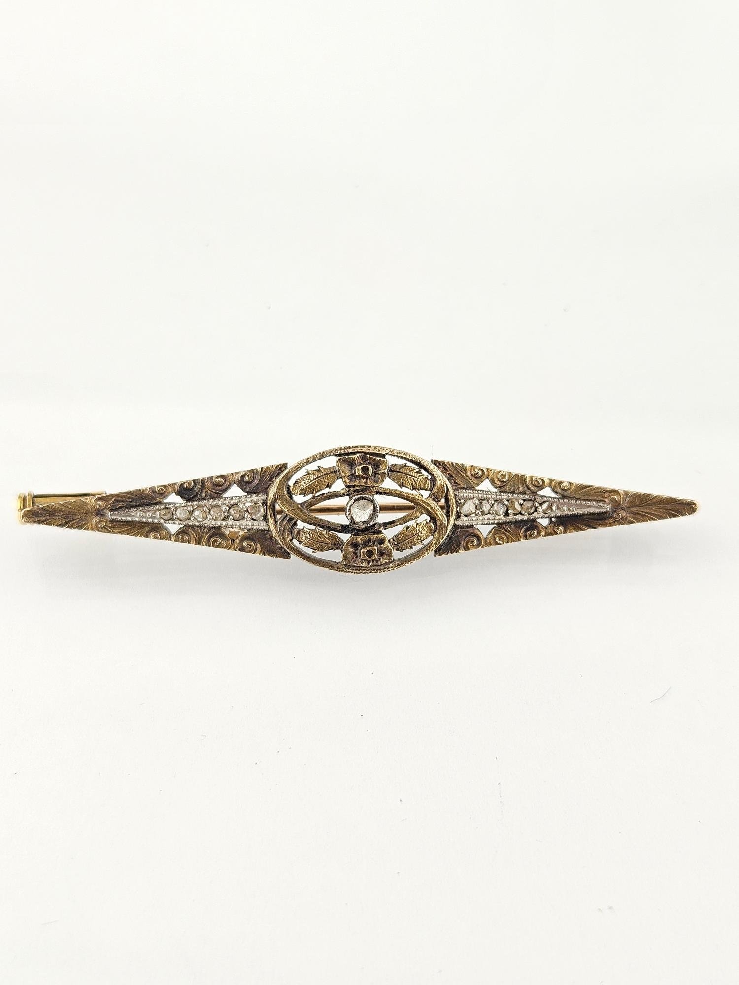 Prendedor plata, oro y diamantes