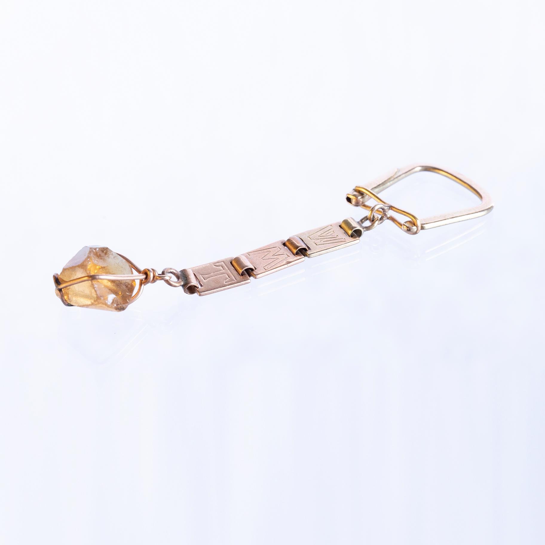 Llavero oro amarillo y topacio