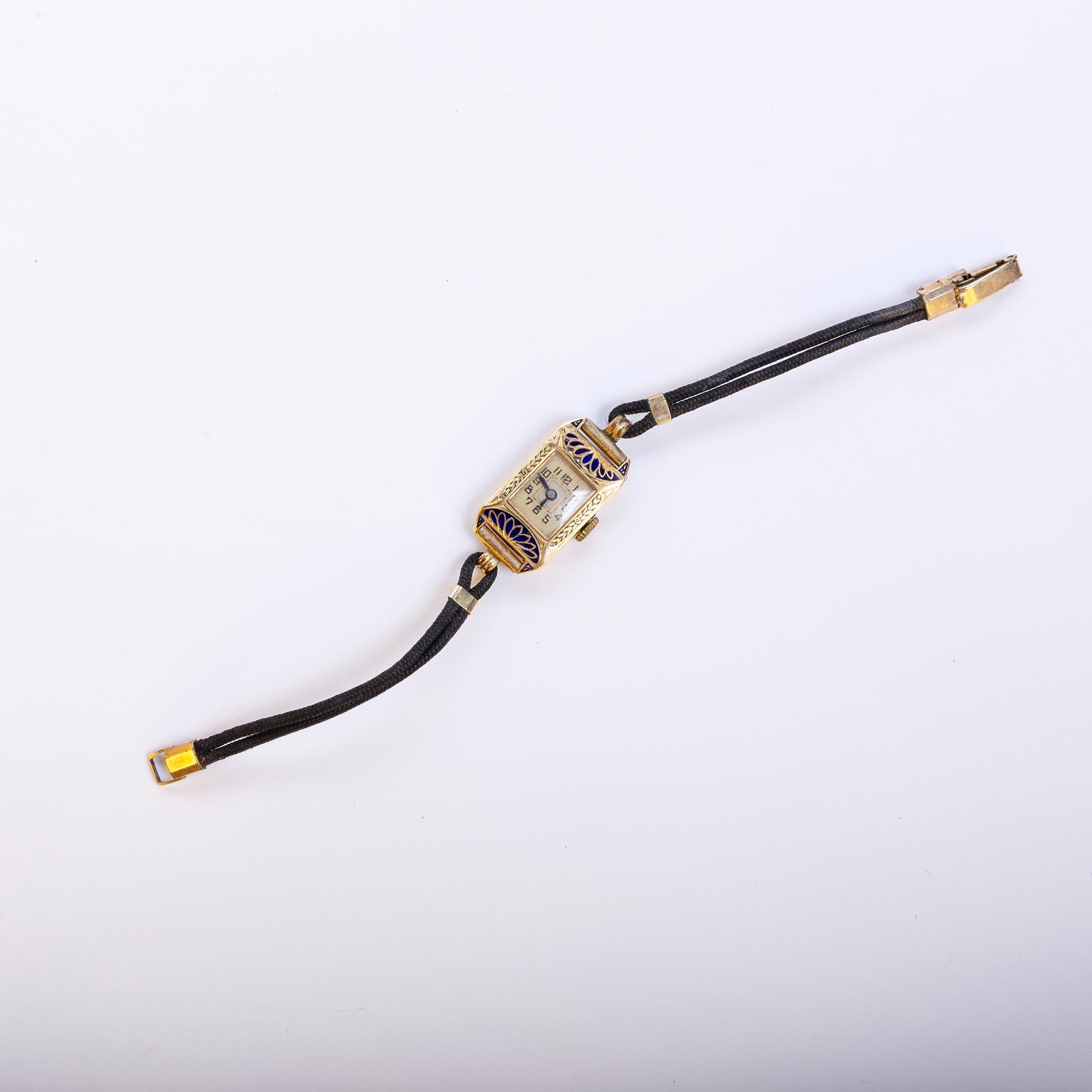 Reloj pulsera art decó 18 K amarillo y esmalte