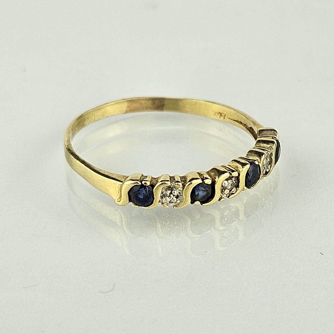 Anillo oro 14 K amarillo, zafiros y brillantes