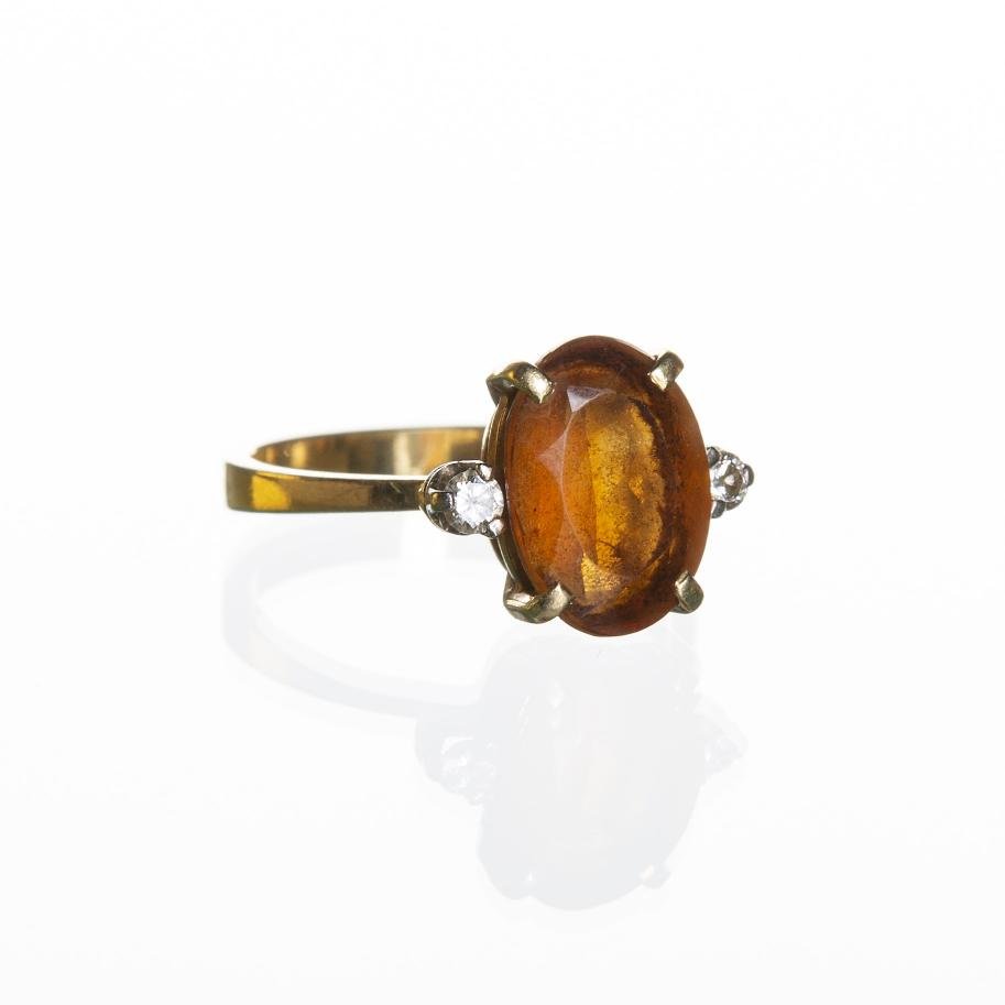 Anillo oro 18 K amarillo, topacio y brillantes