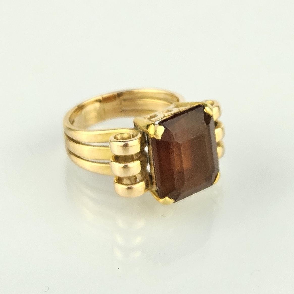 Anillo oro 18 K amarillo con topacio