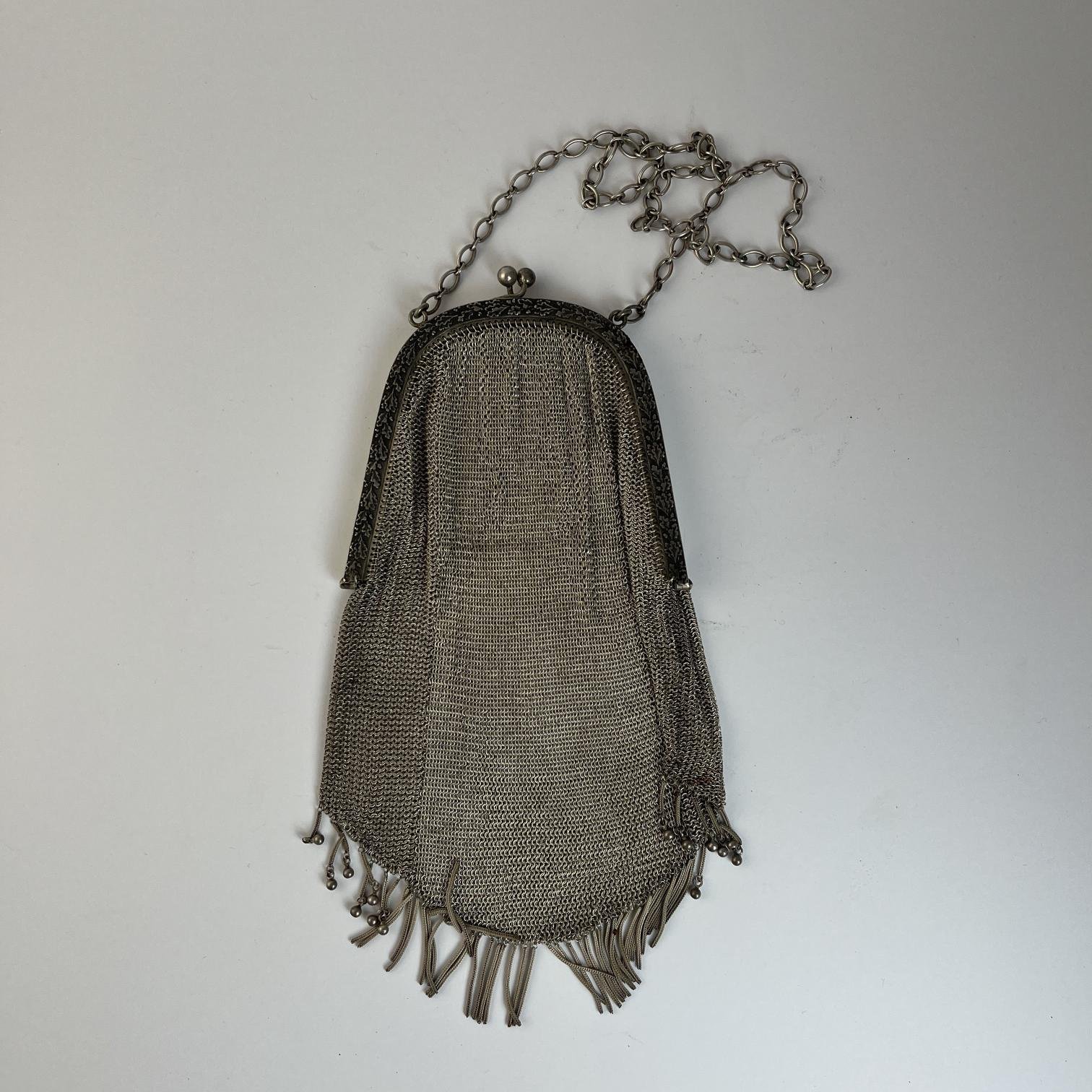 Cartera en malla de plata