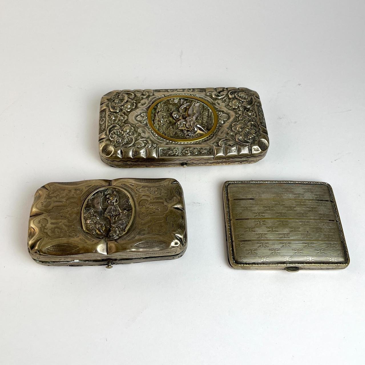 Tres cigarreras de bolsillo en plata