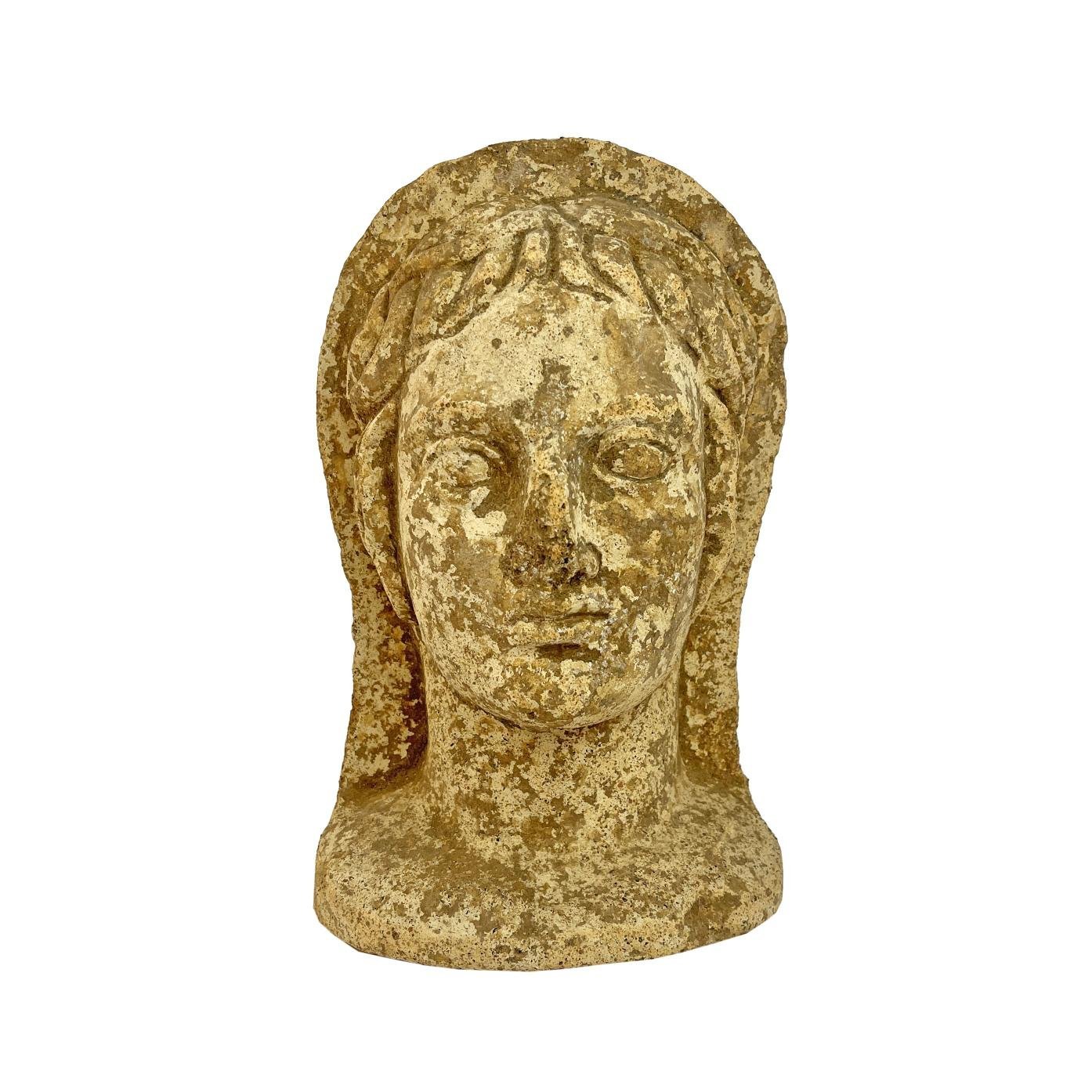 Escultura etrusca s. IV a.C. "Cabeza de mujer."