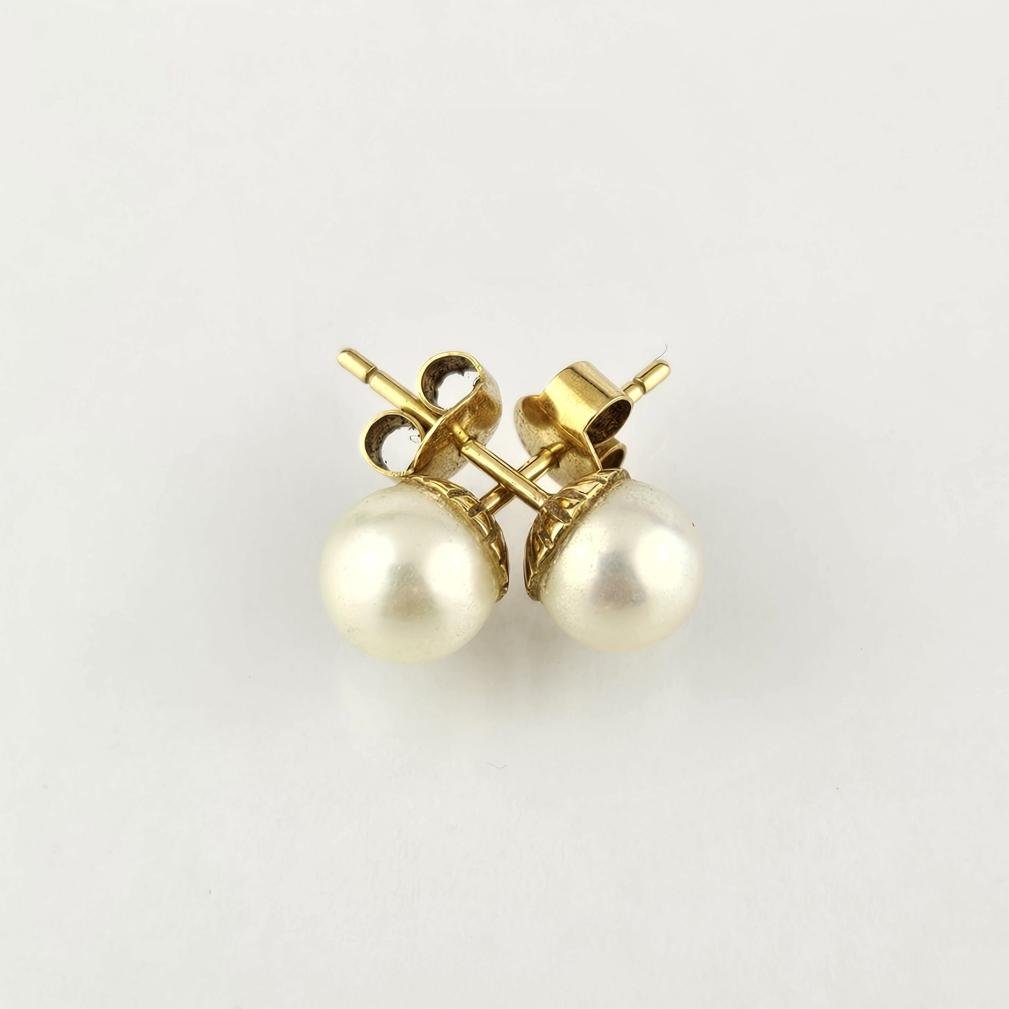 Tornillos oro 18 K y perlas