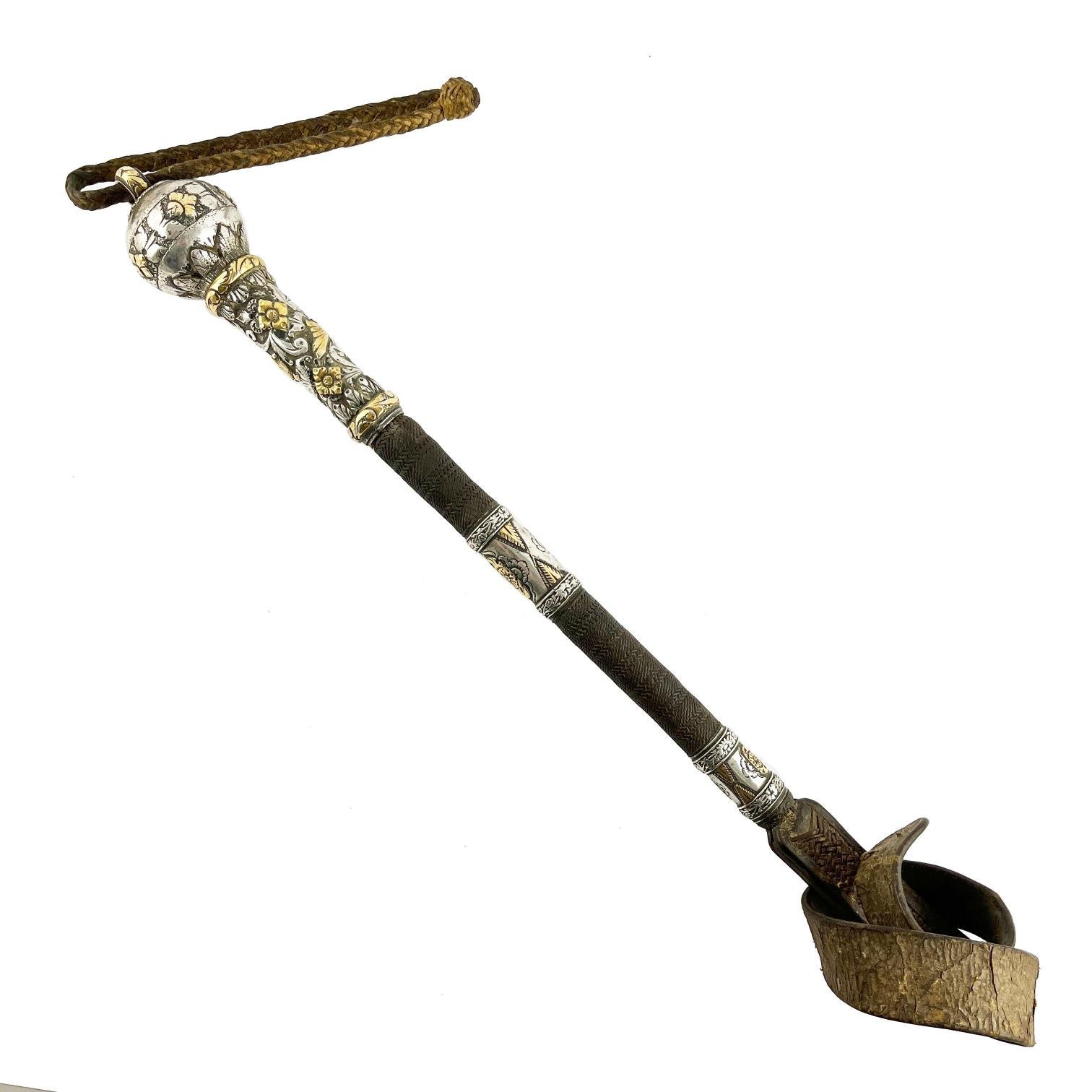 Rebenque con plata y oro