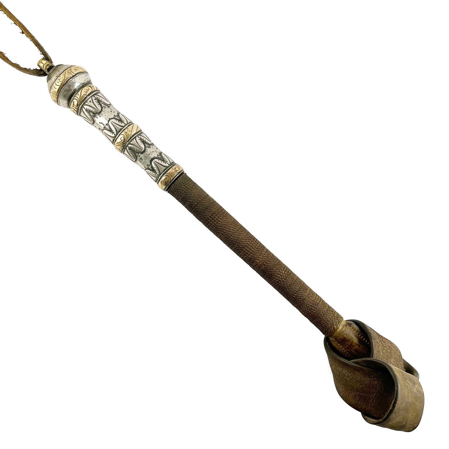 Rebenque con plata y oro