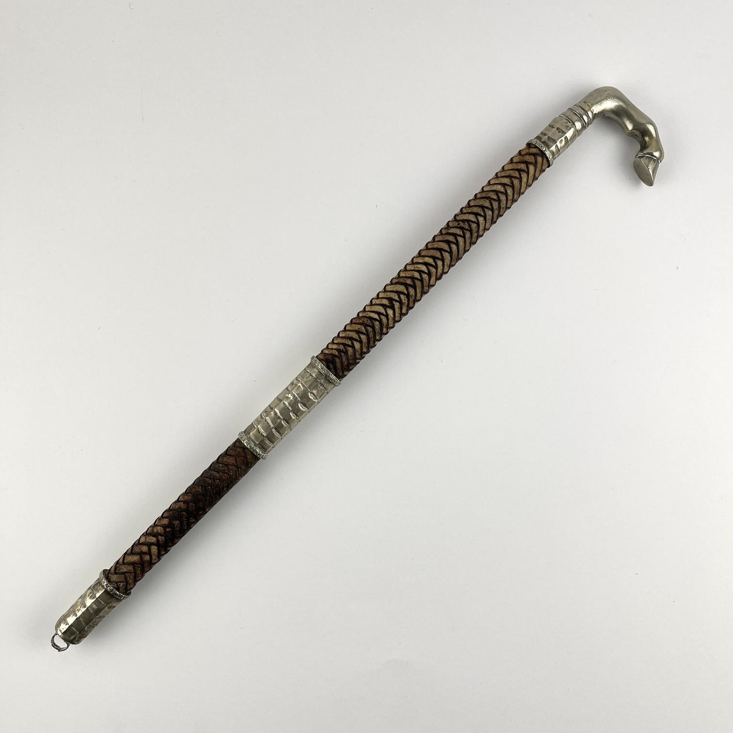 Arreador con pata de caballo