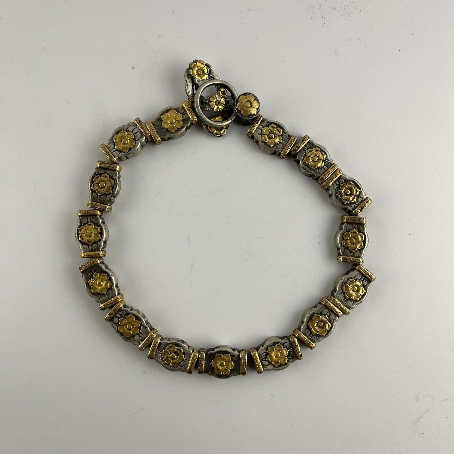 15 pasadores en plata y oro