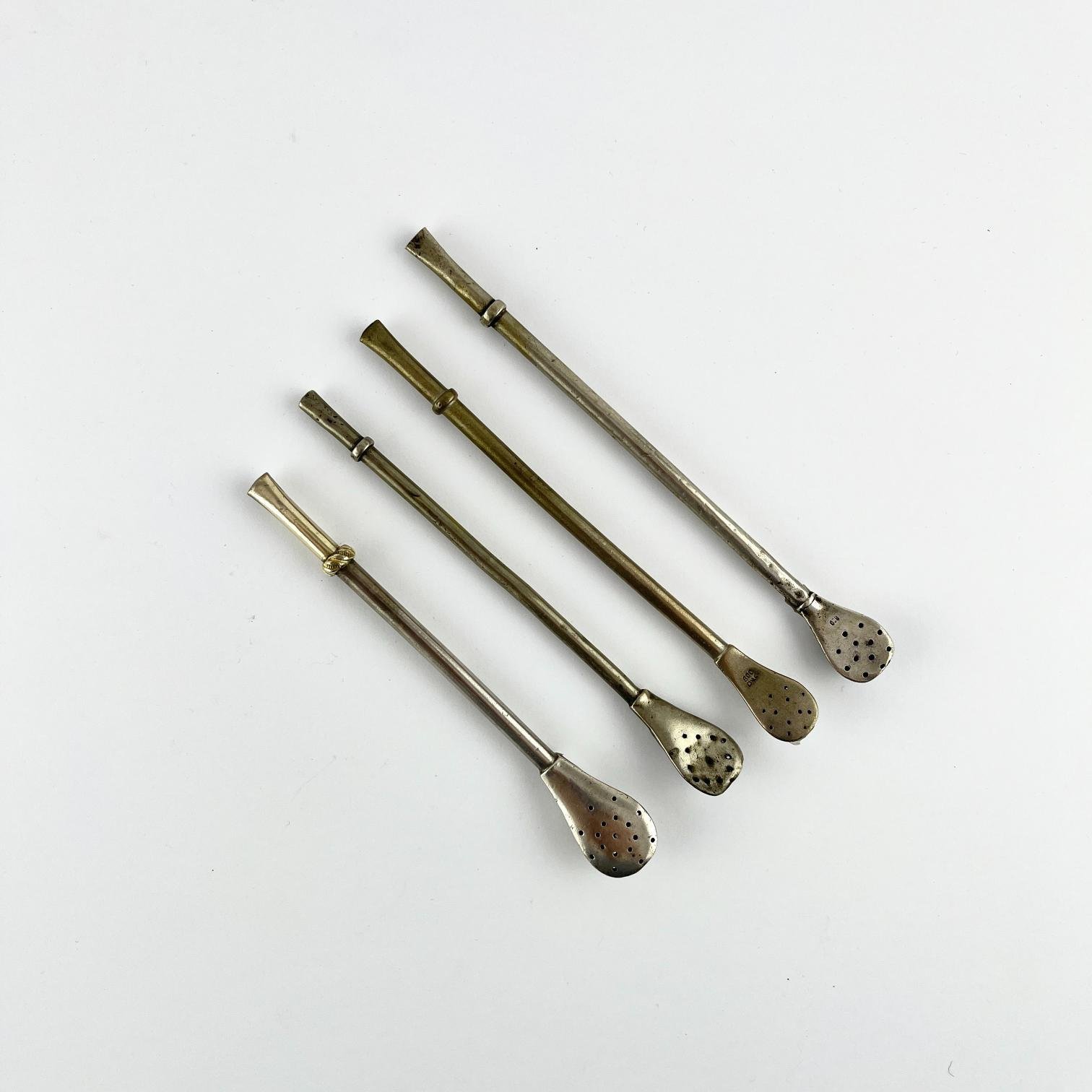 4 pequeñas bombillas en plata