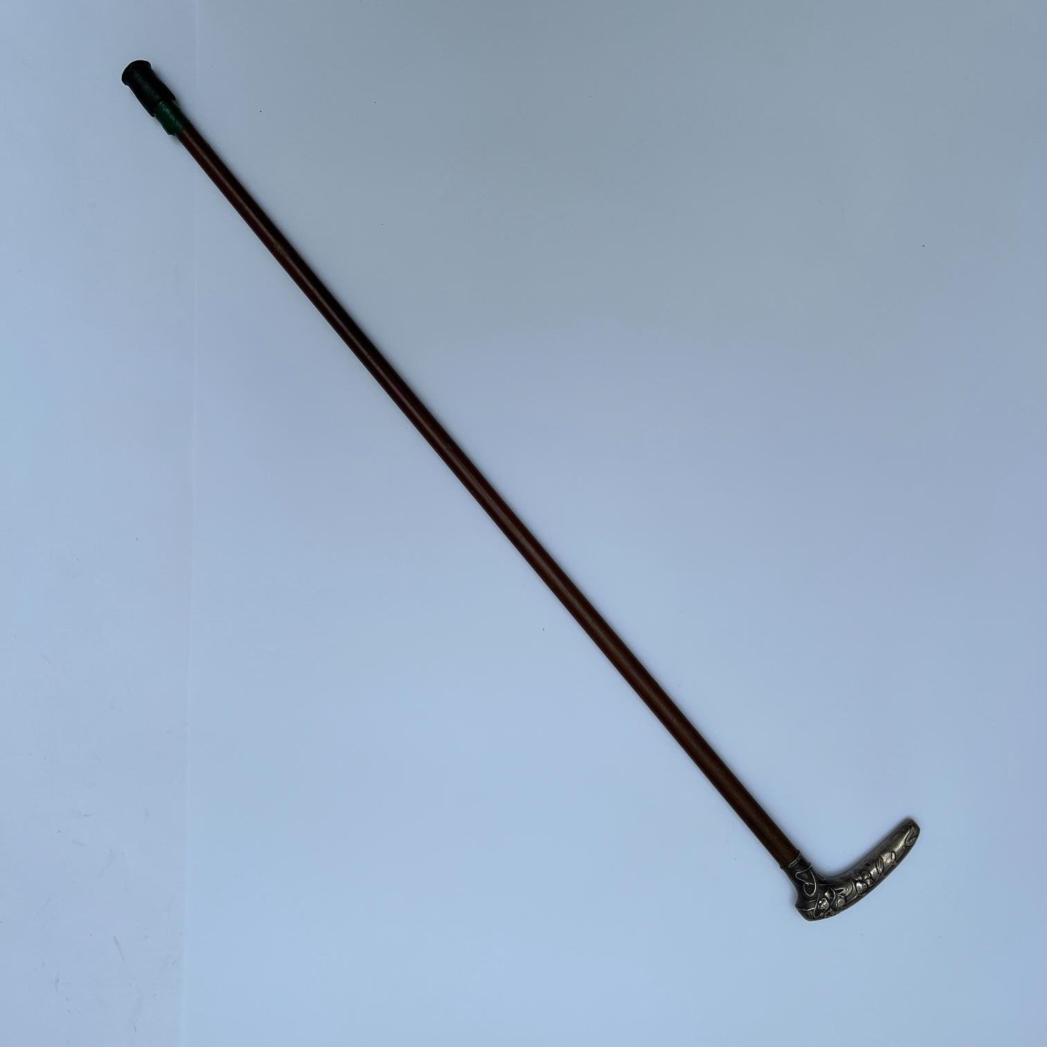 Bastón cabo art nouveau en plata alemana