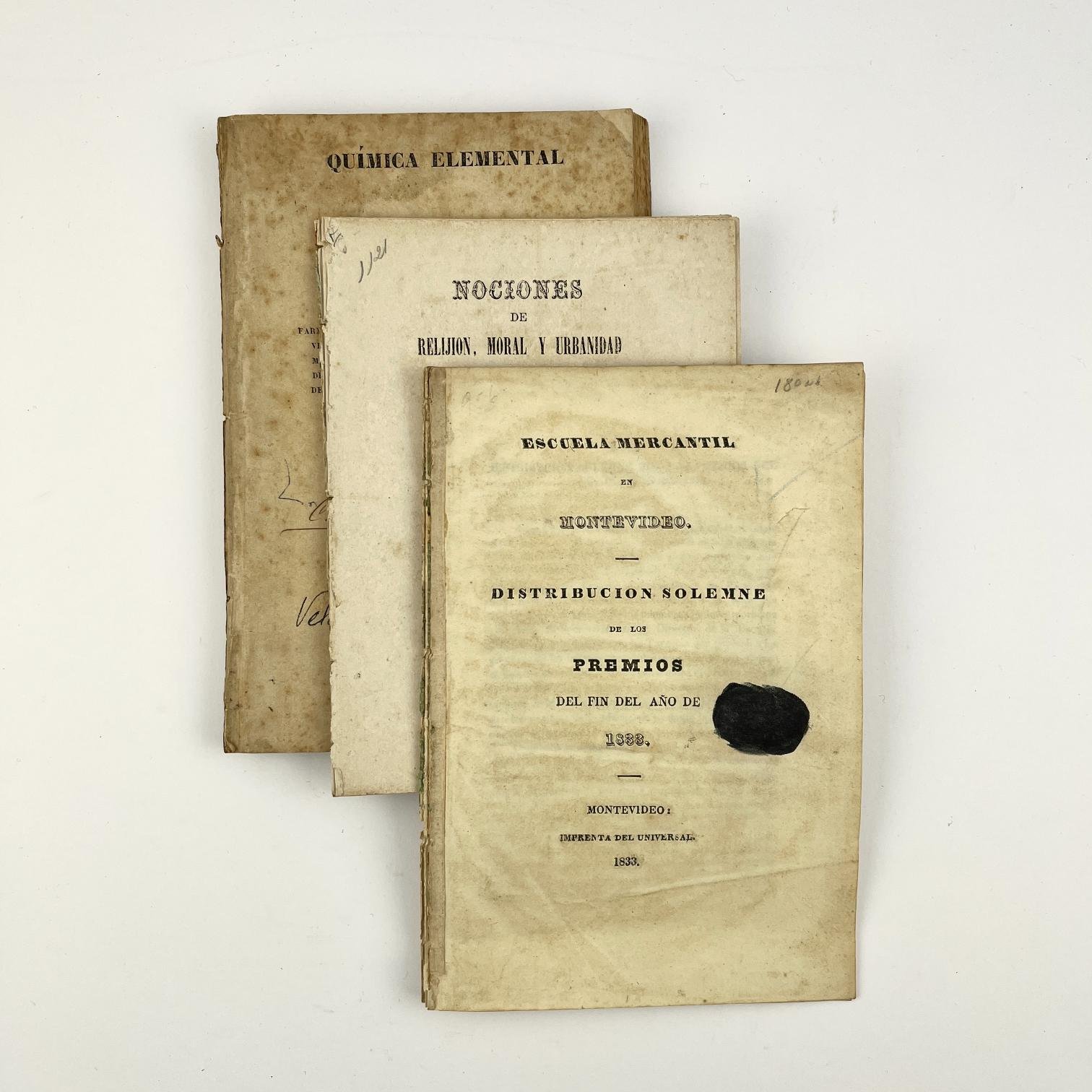 Escuela Mercantil de Montevideo. Distribución solemne de los Premios Acompañado por:
LENOBLE: Química Elemental.
Acompañado por:
JAIME ROLDOS Y PONS: Nociones de Relijion (sic), Moral y Urbanidad ordenadas por D.