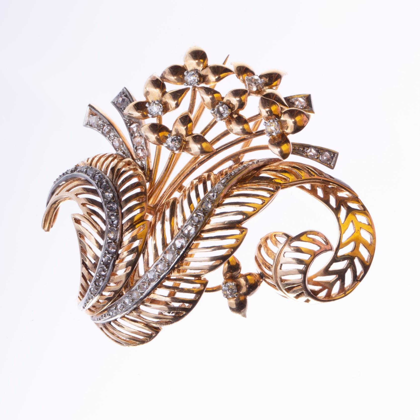 Prendedor oro 18 K amarillo y blanco y diamantes