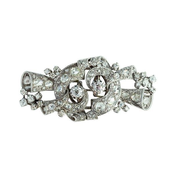 Prendedor platino y diamantes