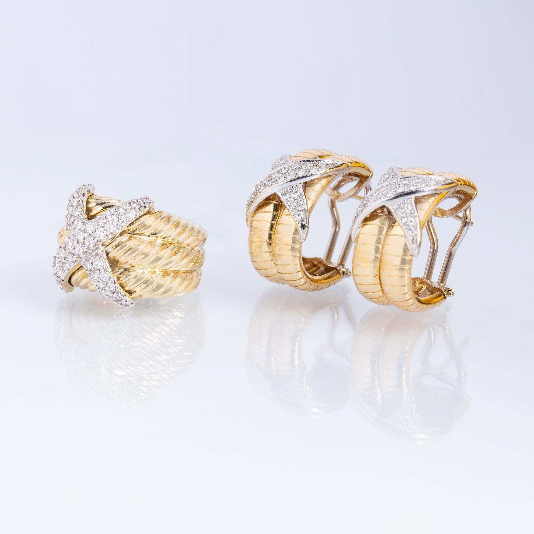 Set de anillo y caravanas en oro 18 K aamrillo y diamantes