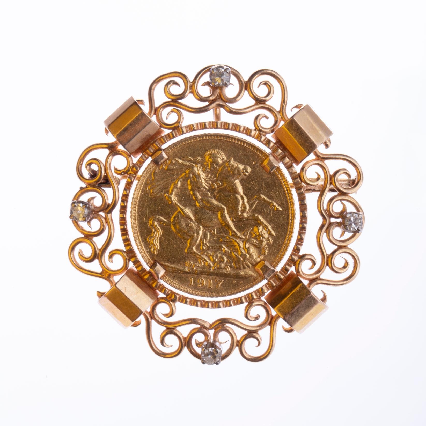 Prendedor oro 18 K amarillo, diamantes y libra