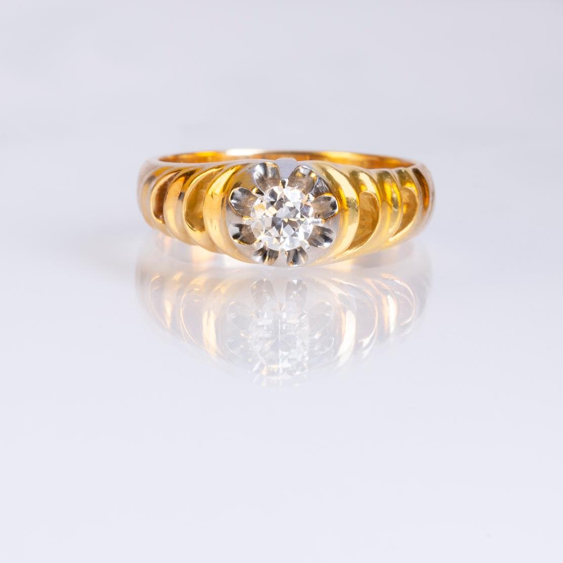 Anillo oro 18 K amarillo y diamante