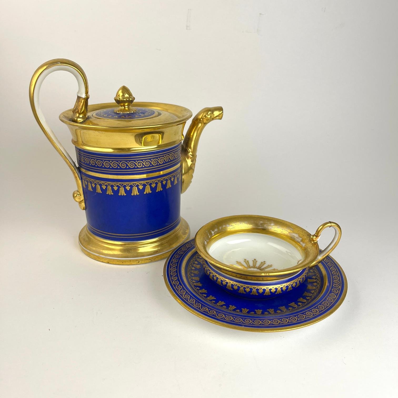 Juego para té en porcelana azul y dorado