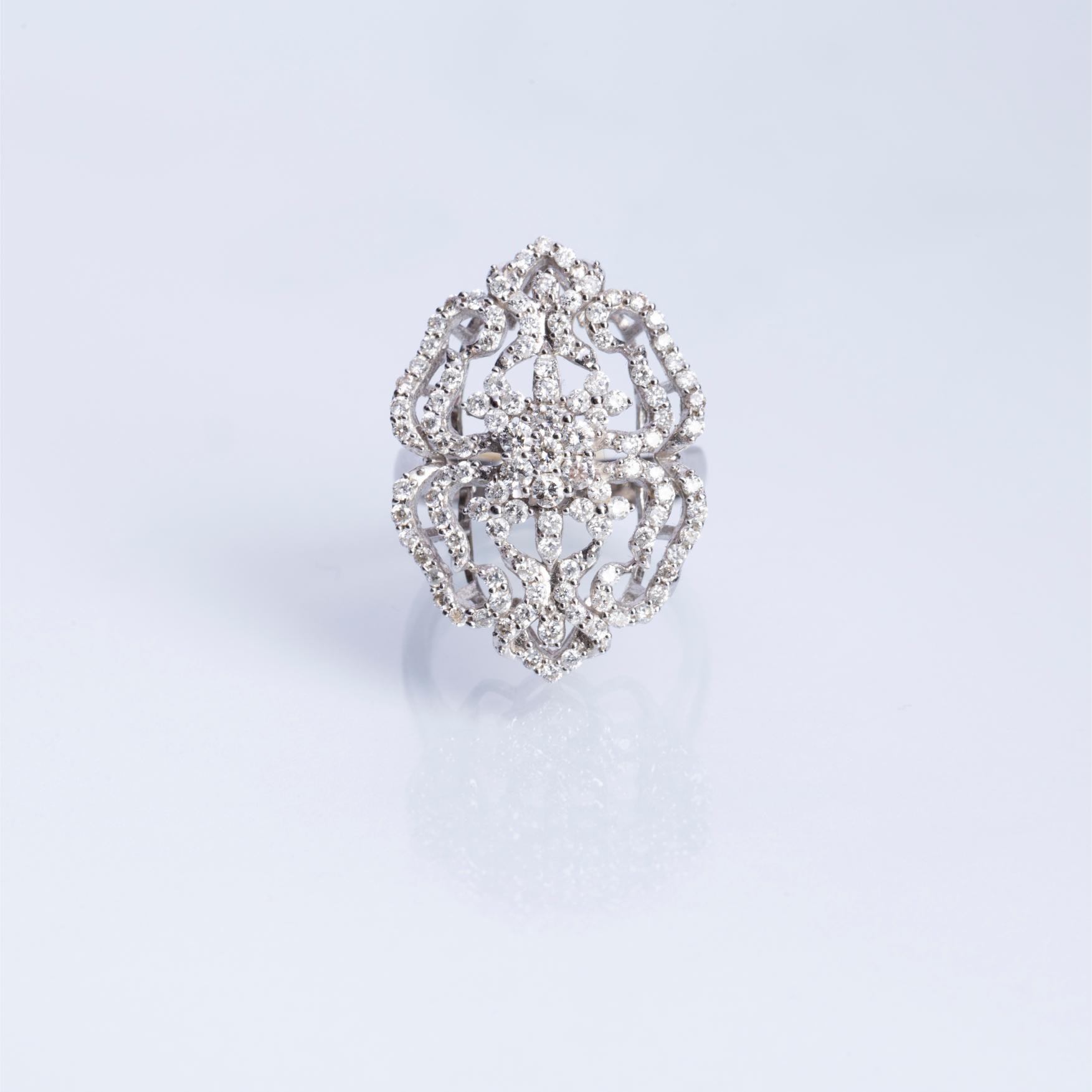 Anillo oro 18 K blanco y diamantes