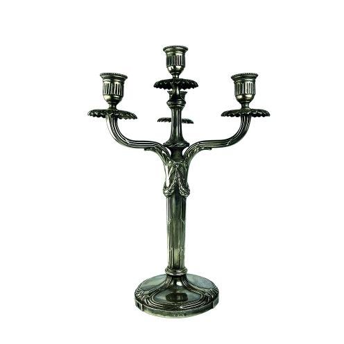 Par de candelabros cuatro luces en metal plateado