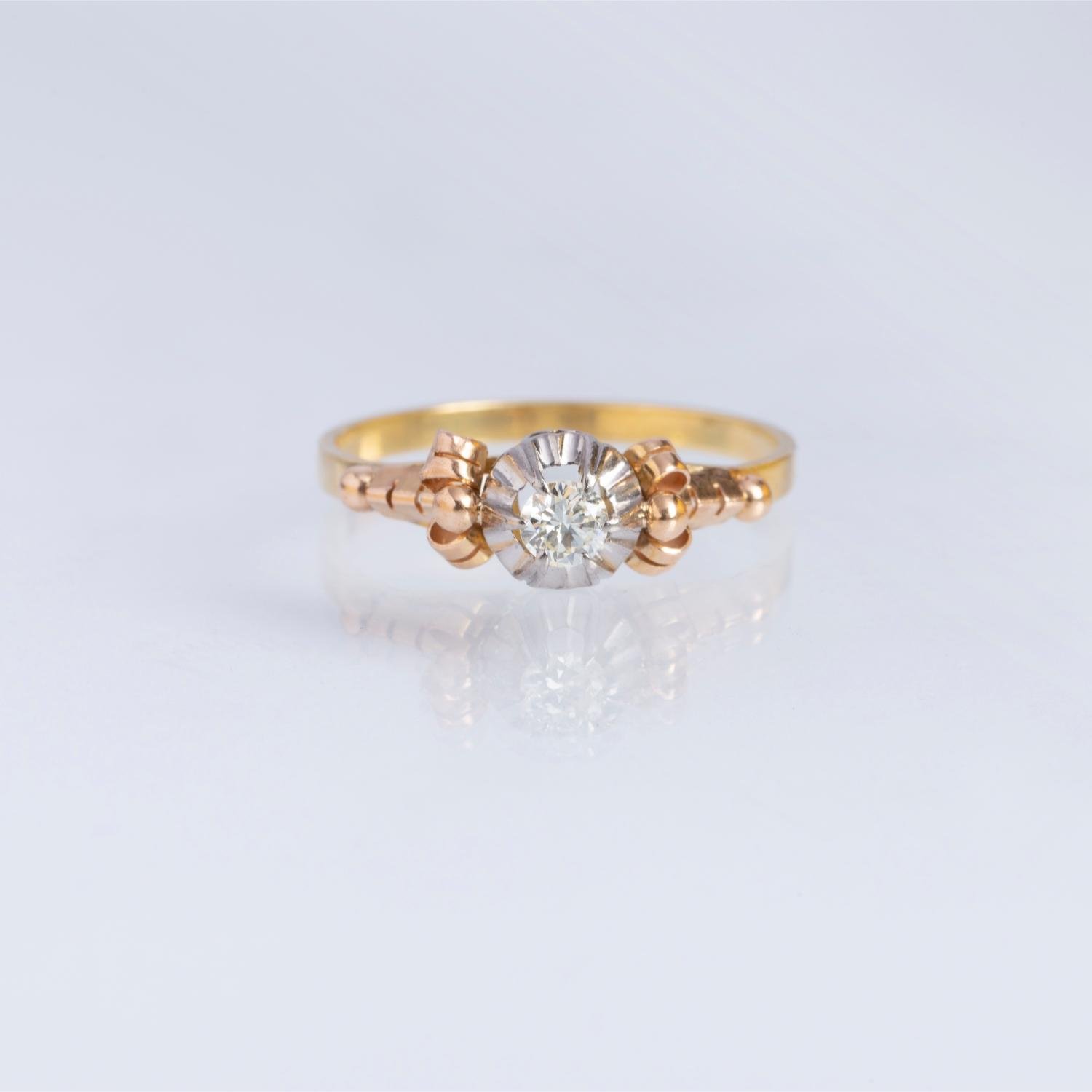 Anillo oro 18 K amarillo y blanco y diamante