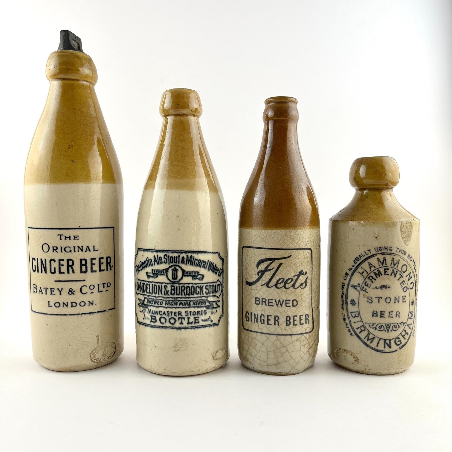 Cuatro botellas en gres