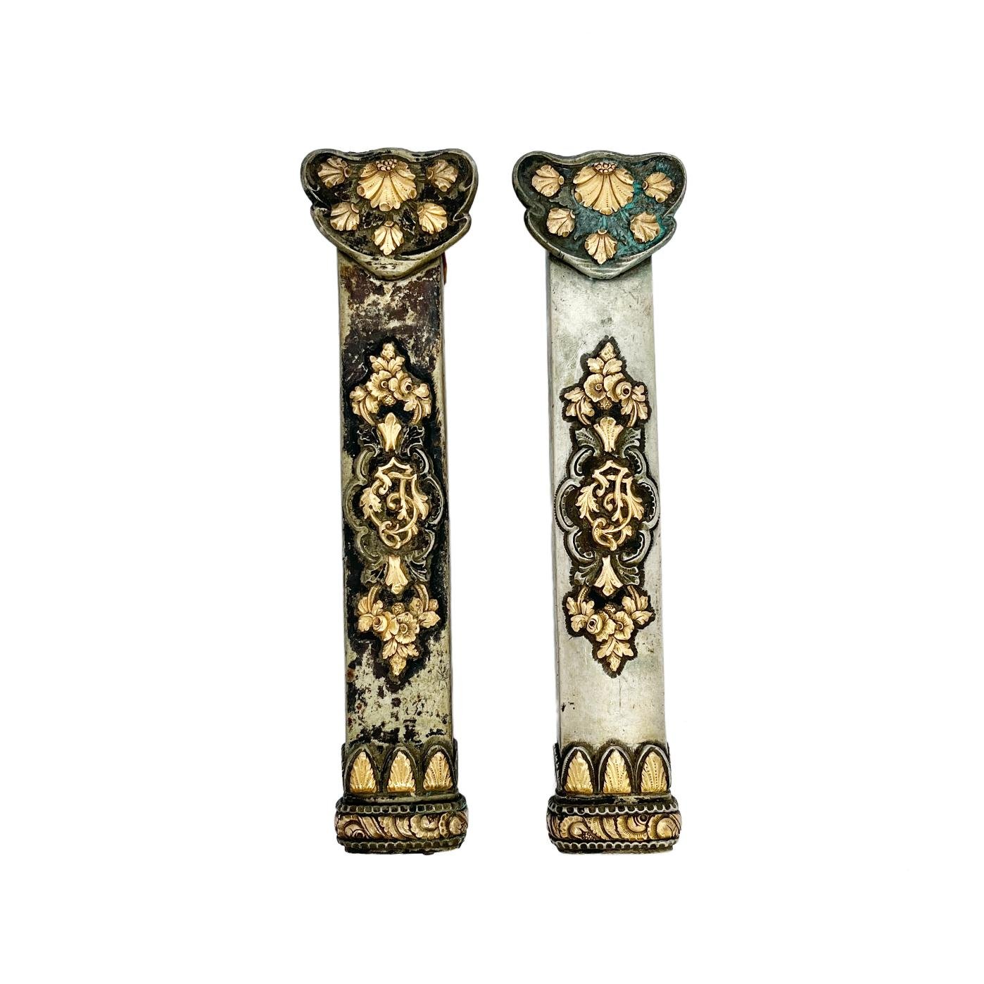 Par de pasadores en plata y oro