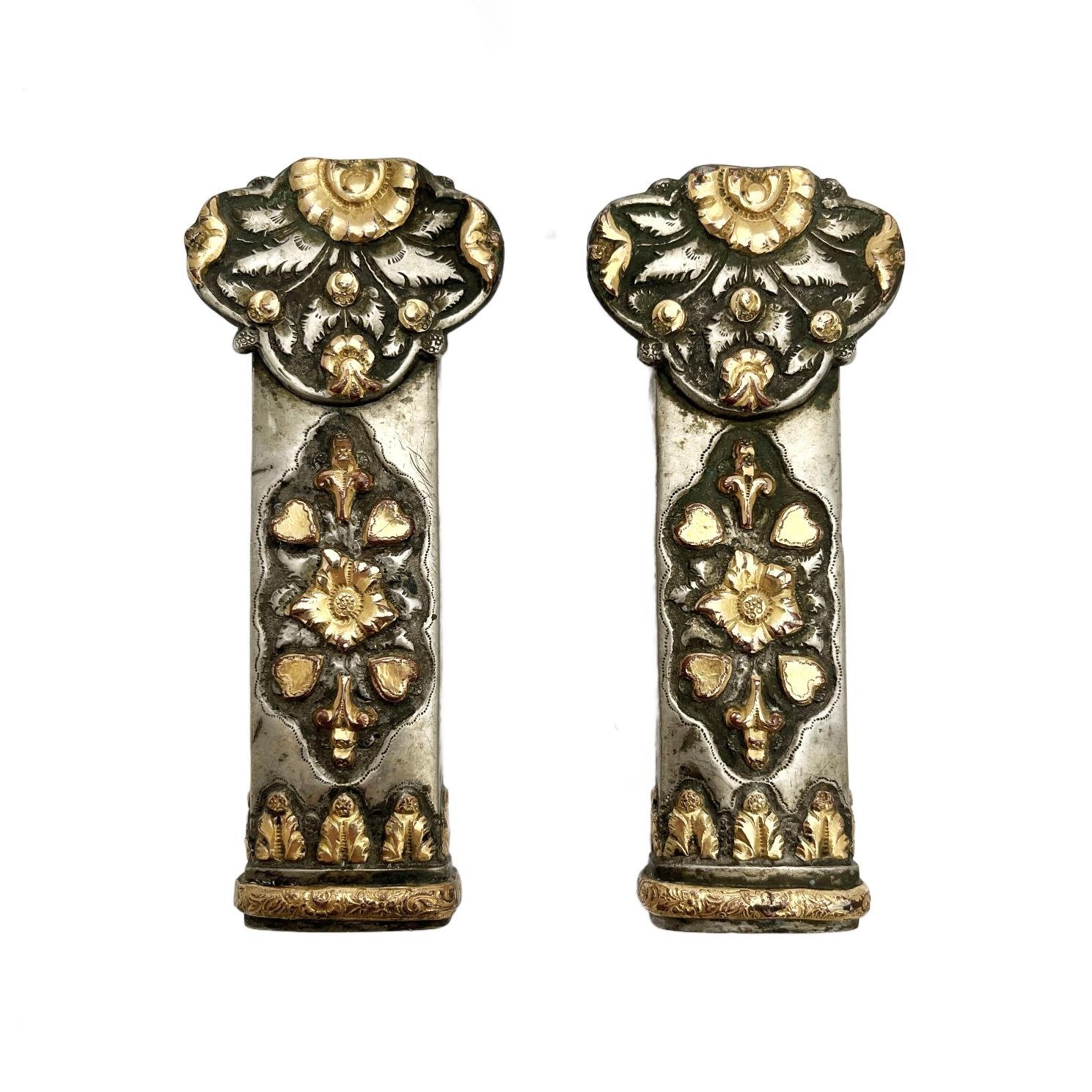 Par de pasadores en plata y oro