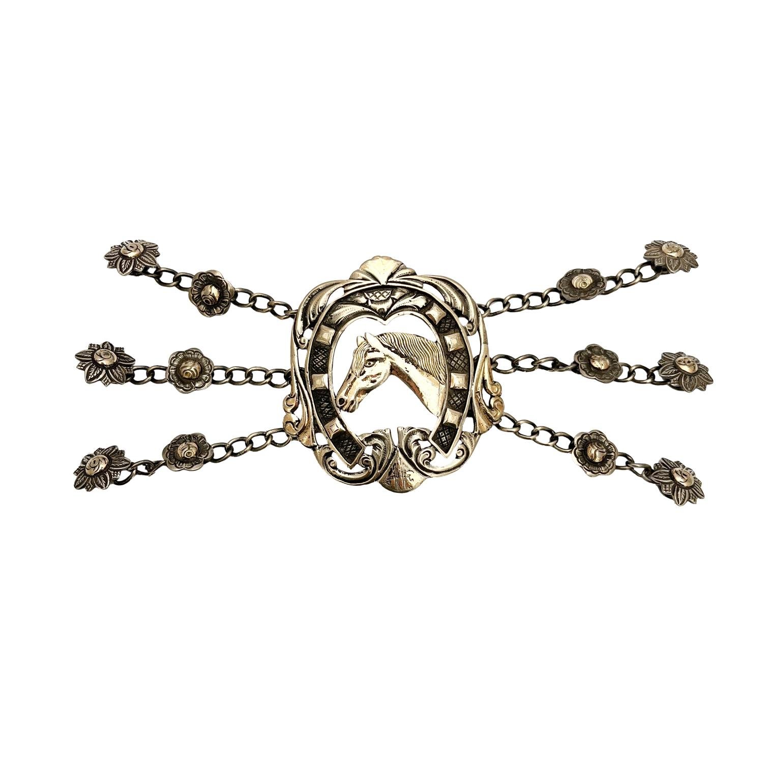 Rastra criolla en plata y oro