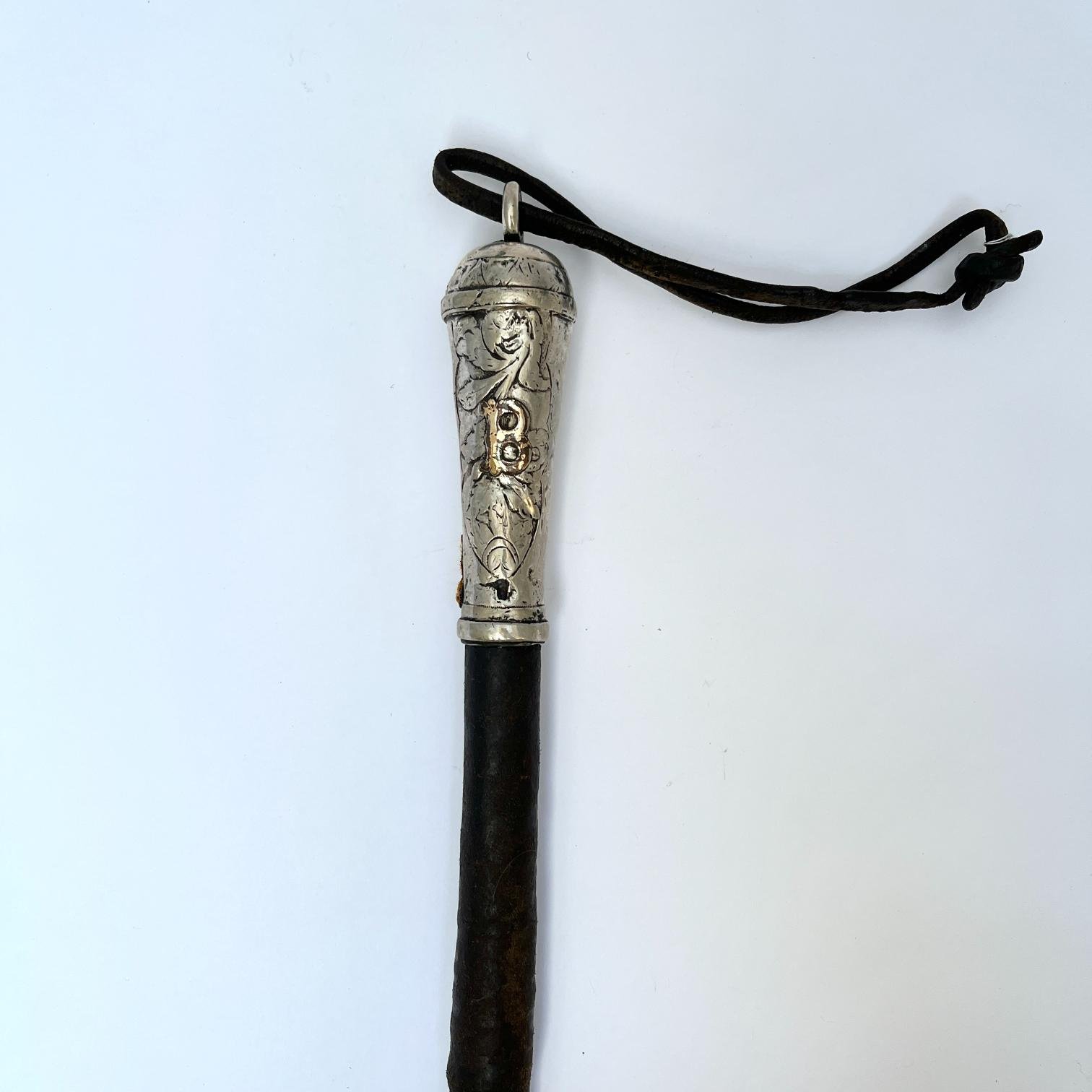 Rebenque en plata y oro