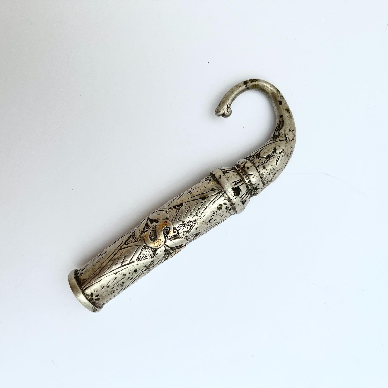 Cabo de arreador en plata y oro