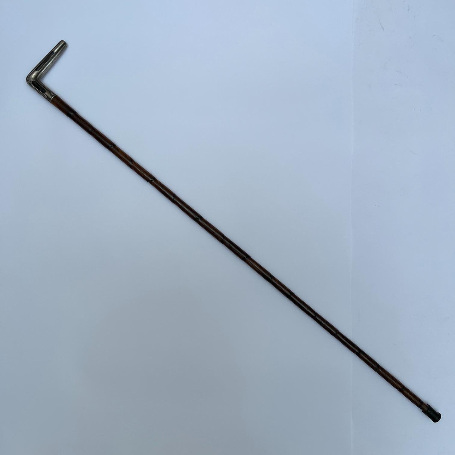 Bastón en madera y plata