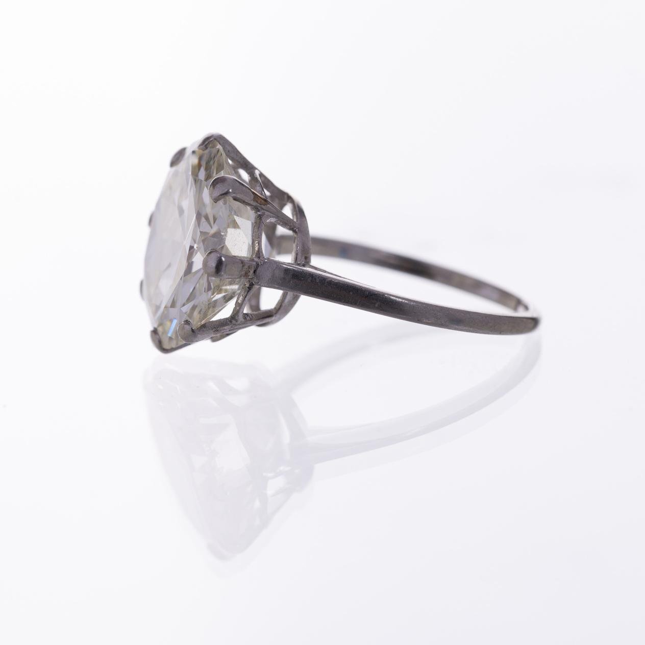 Anillo solitario en oro 18 K con brillante