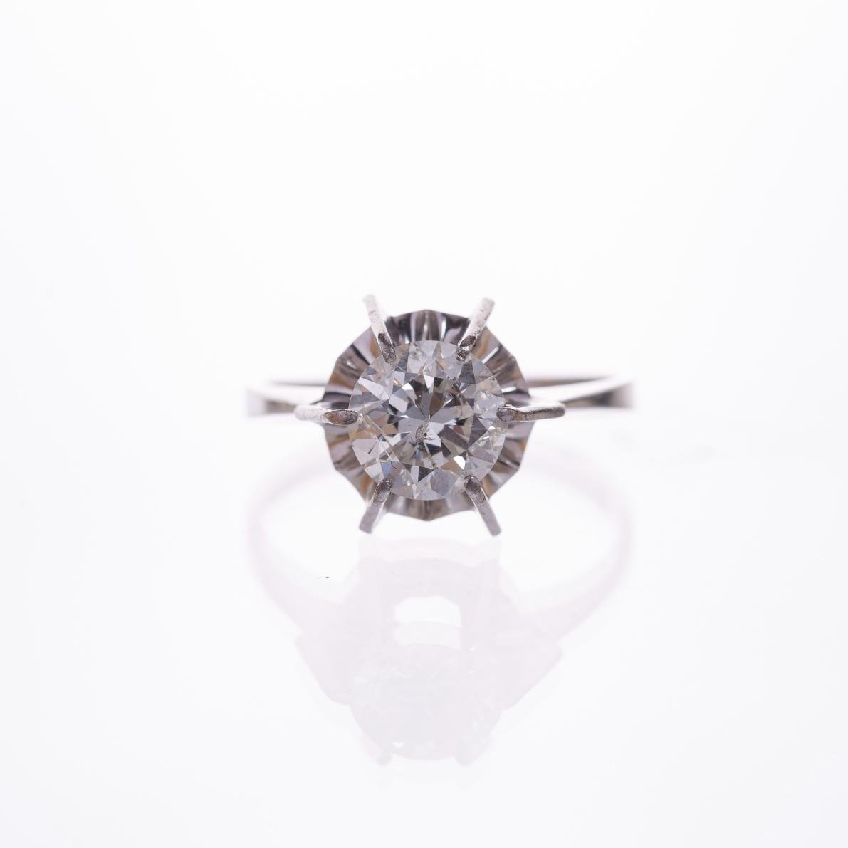 Anillo solitario en oro 18 K con brillante