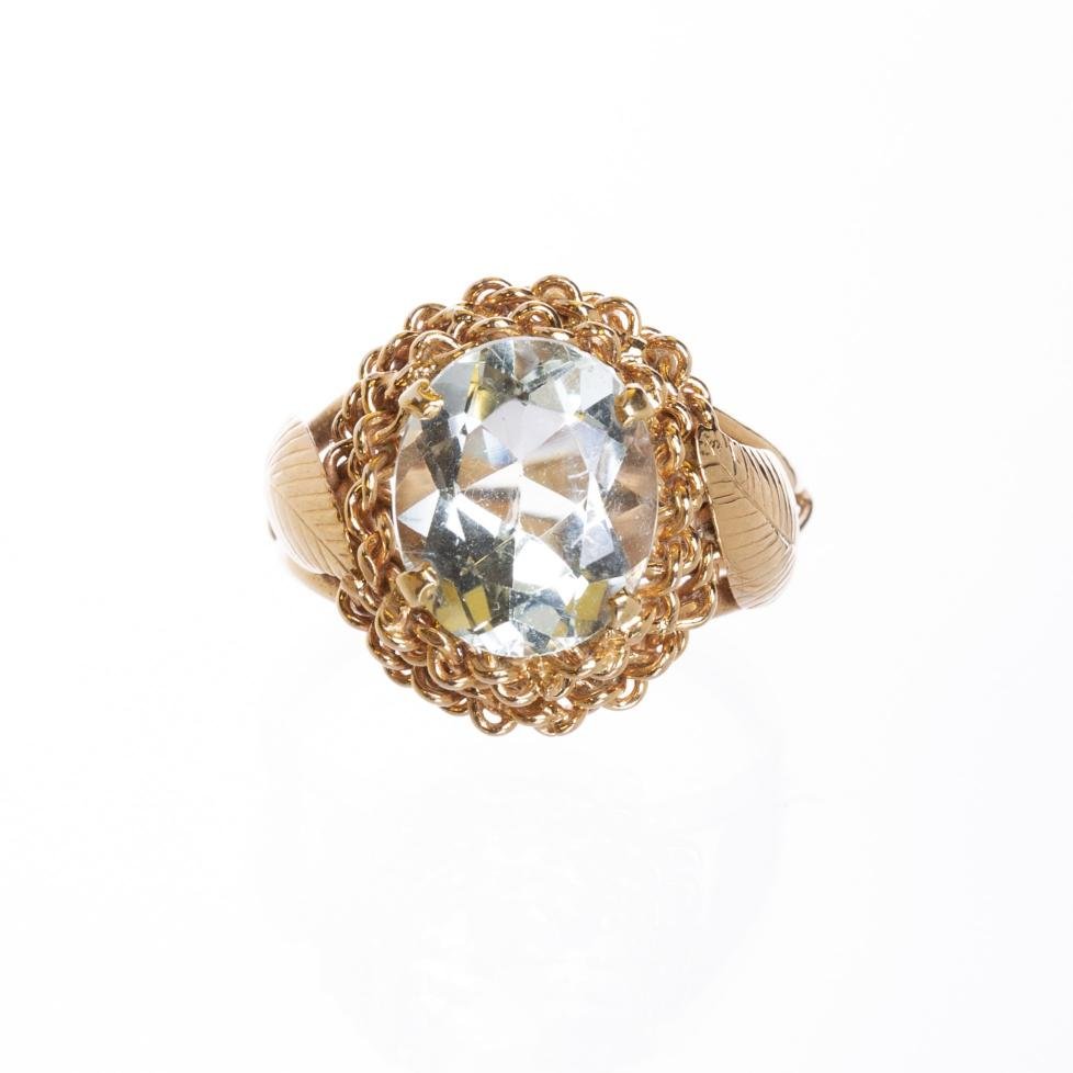 Anillo en oro 18 K con aguamarina