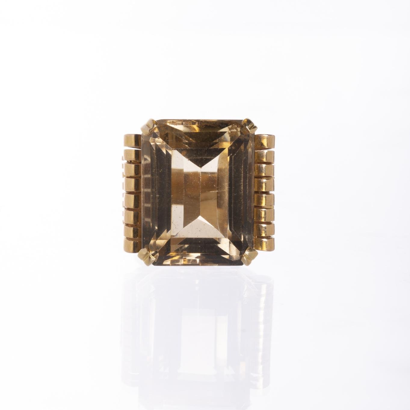 Anillo en oro 18 K con topacio