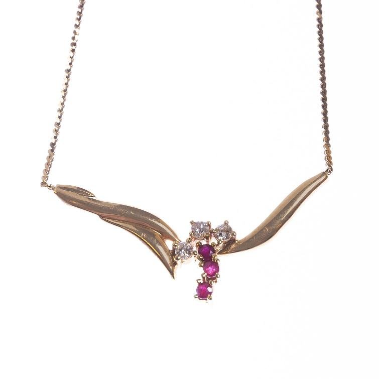 Gargantilla en oro 18 K con brillantes y rubíes
