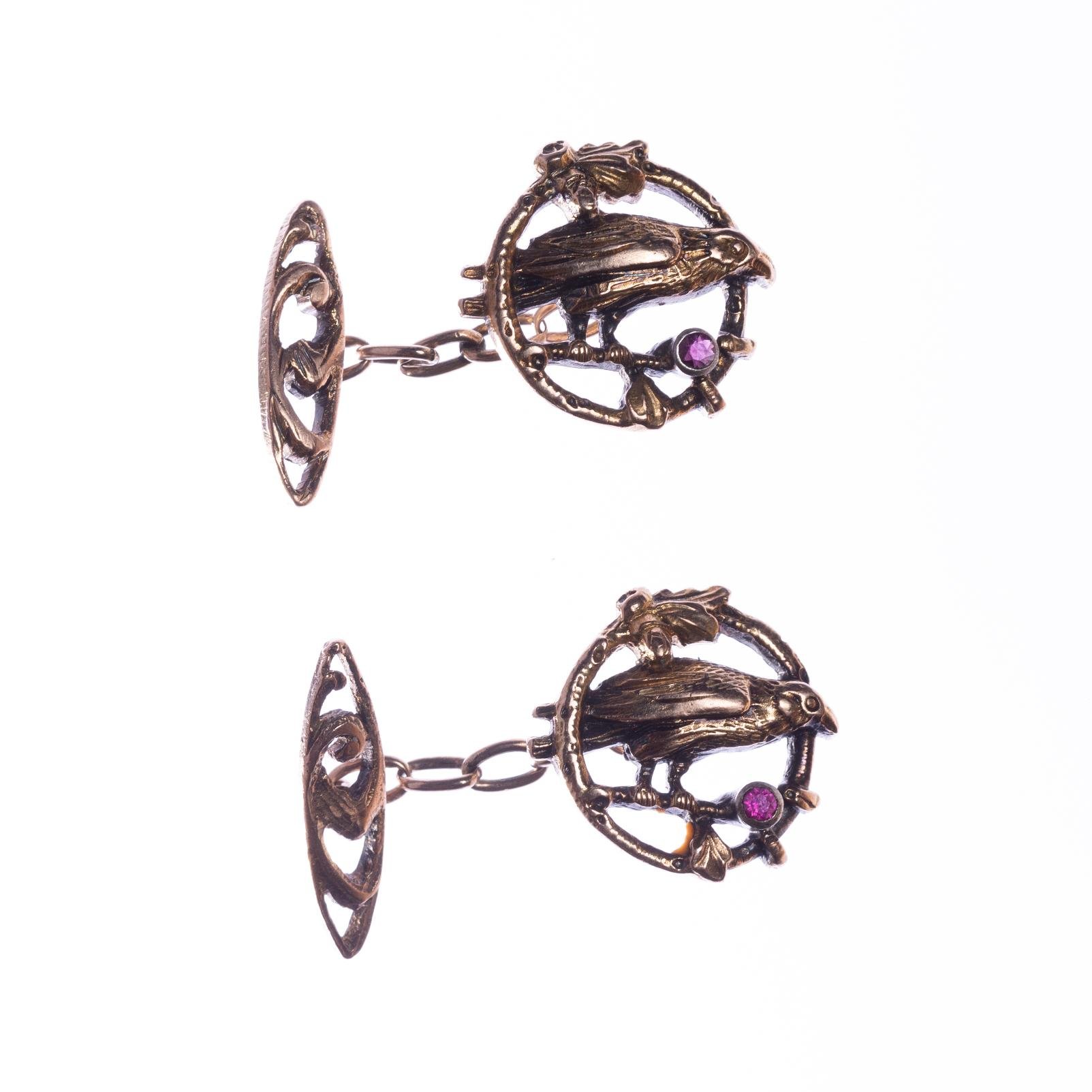 Gemelos en oro y rubíes