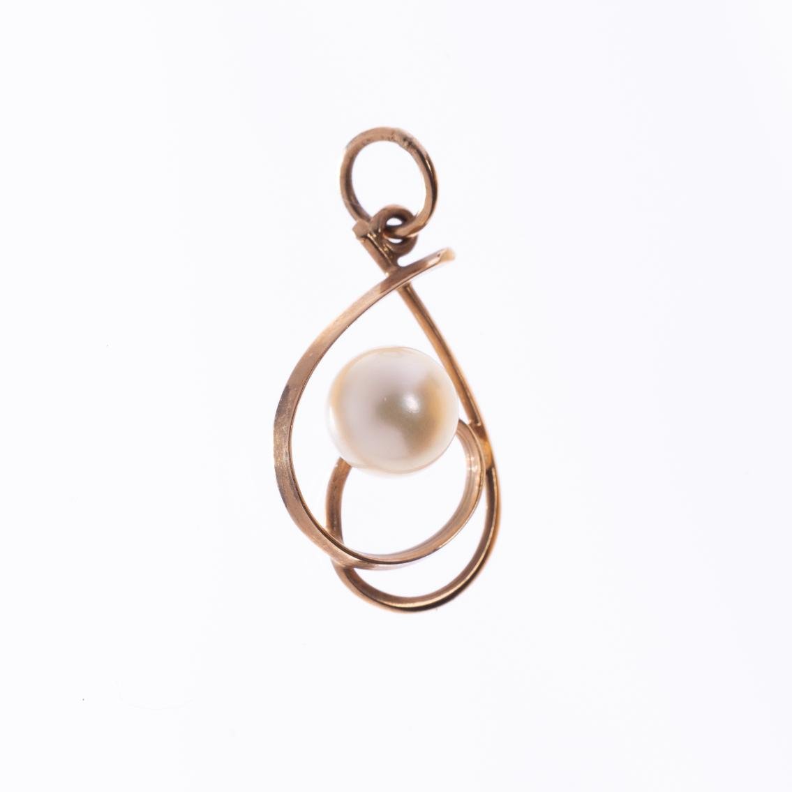 Colgante en oro 18 K con perla