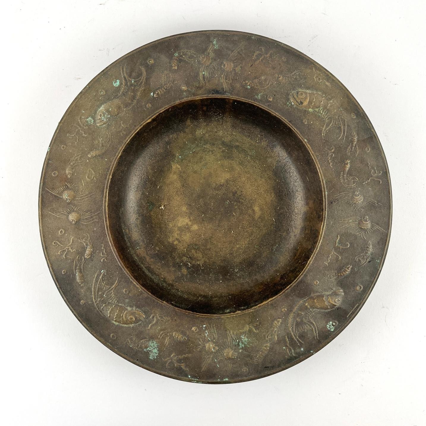 Plato oriental en bronce