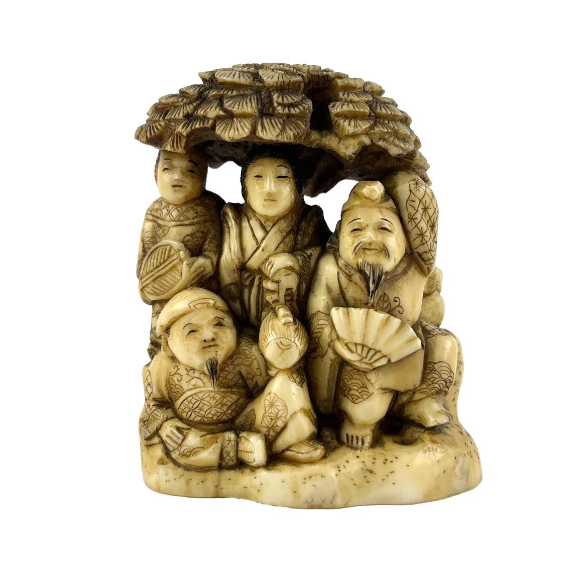 Okimono japonés en marfil