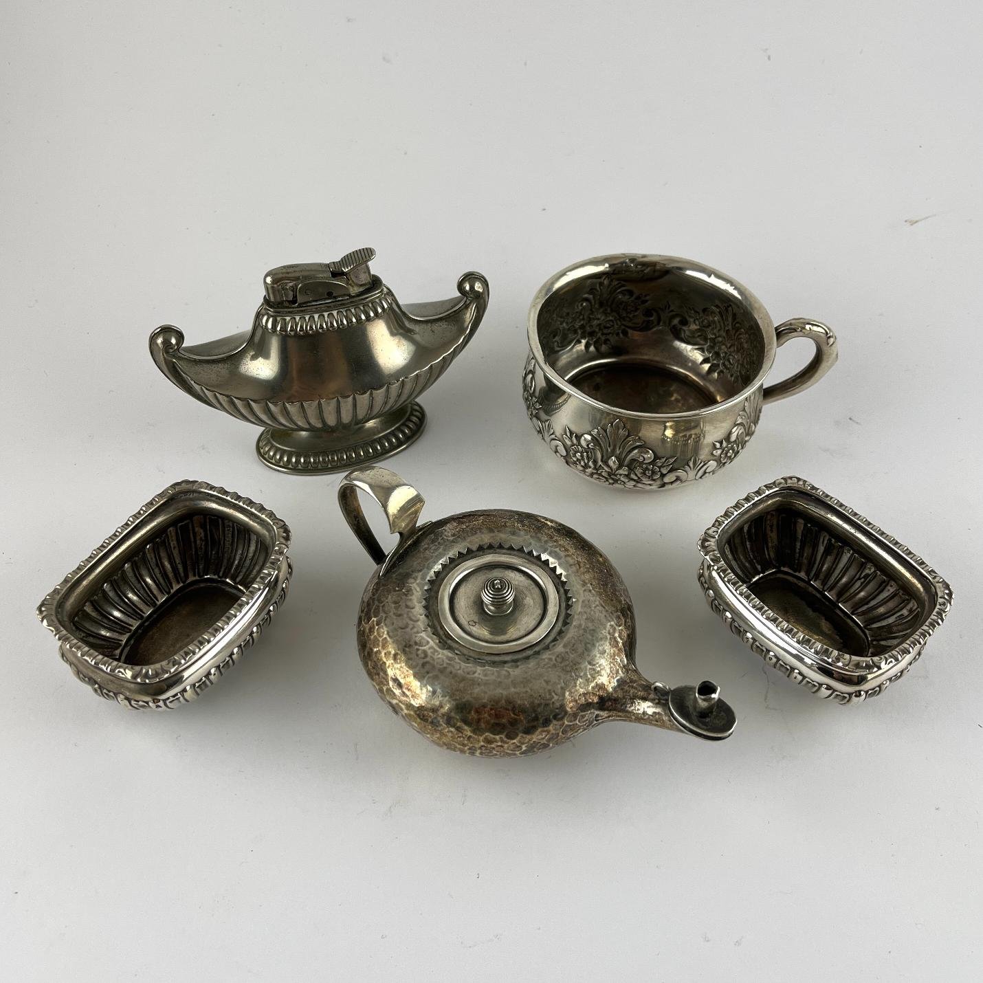 Cuatro piezas en plata