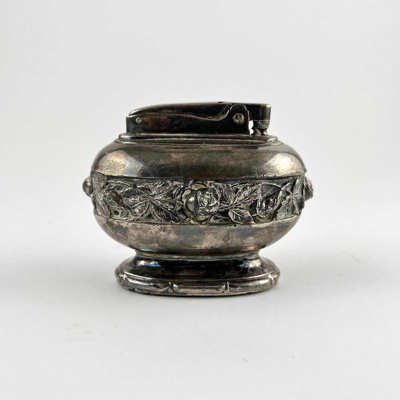 Encendedor en metal plateado