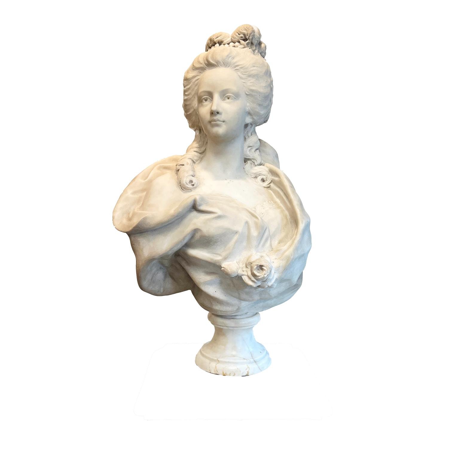 Escultura en mármol blanco "Busto de dama"