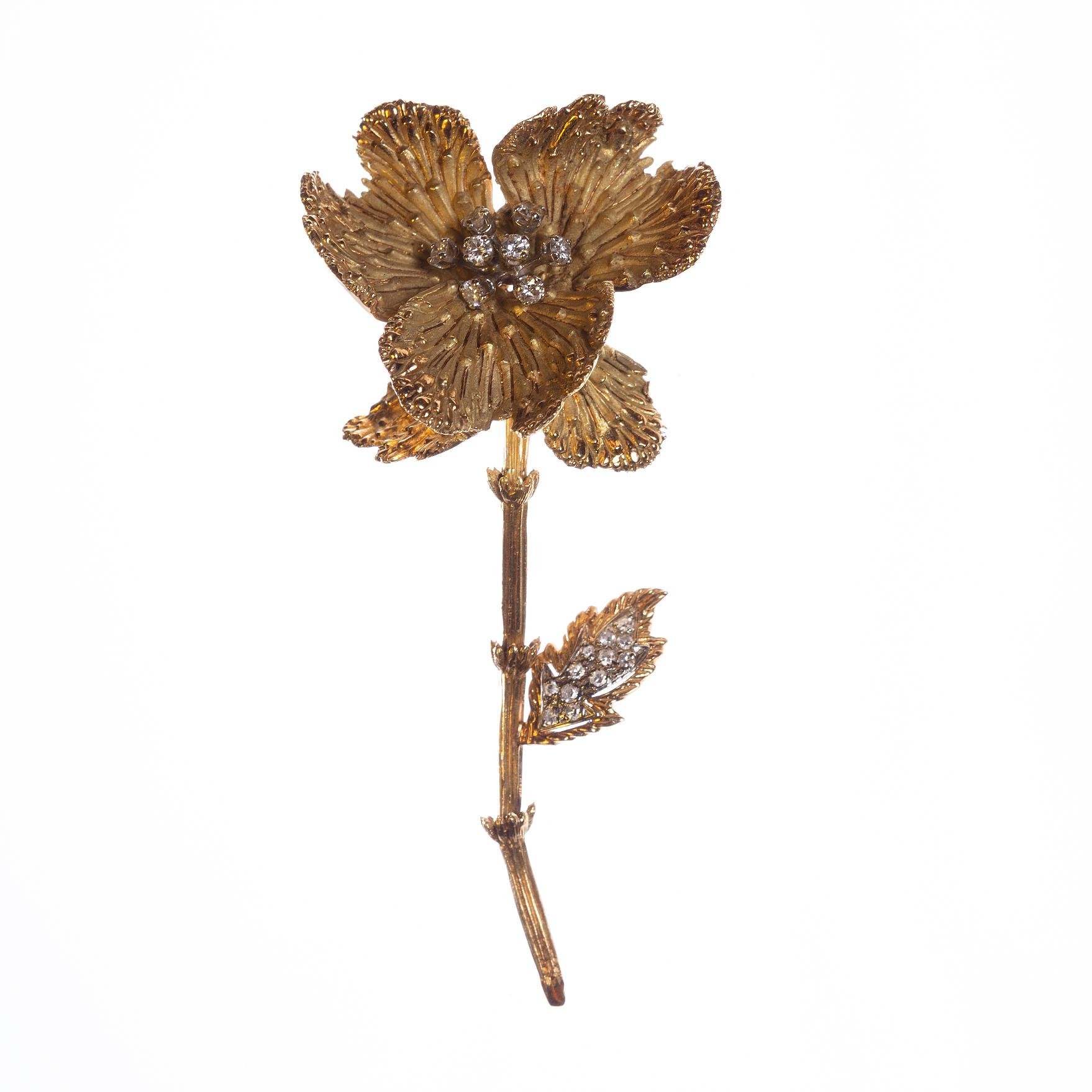 Prendedor en oro 18 K y brillantes