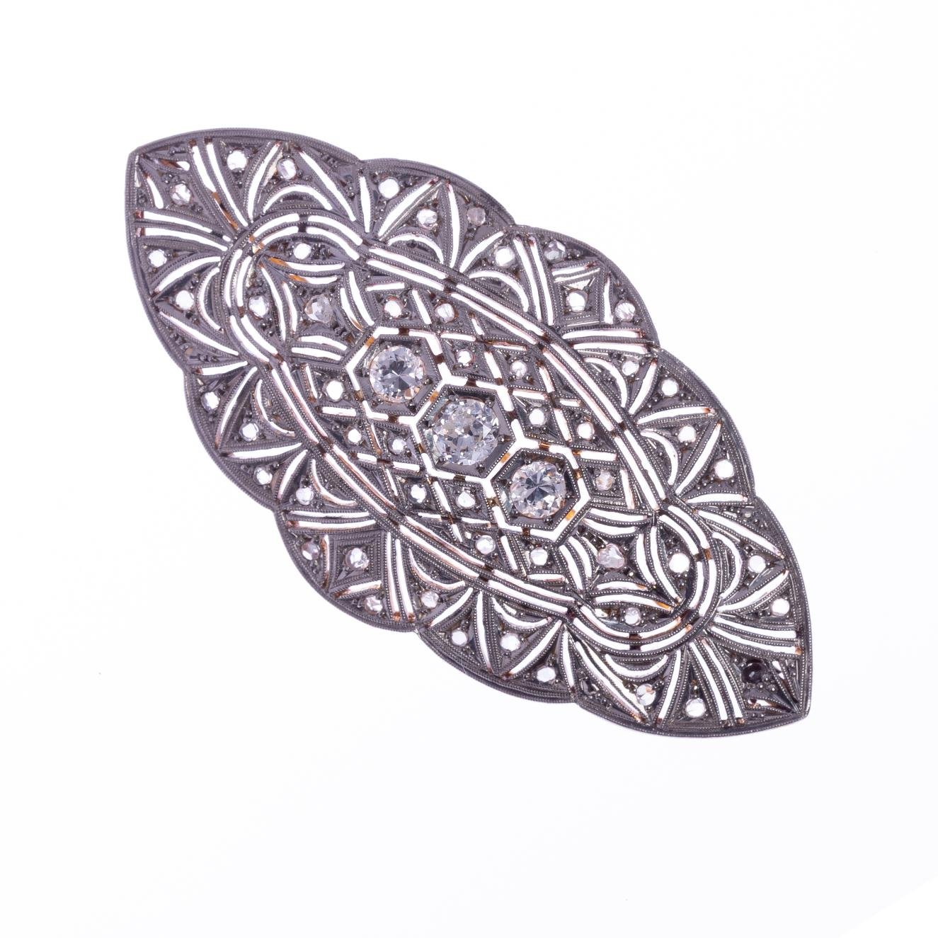 Prendedor art decó en oro 18 K con brillantes y diamantes